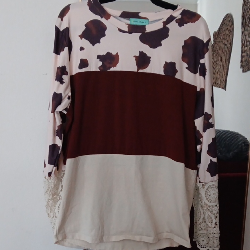 Sunshine & Rodeos Animal Print Top with Lace Accents